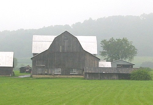 Lycoming County barn with two gambrel roofs and two shed roofs, c. 1880-1930.