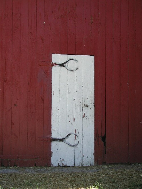 This barn from Cumberland County shows a human-size door in the larger eaves-side door