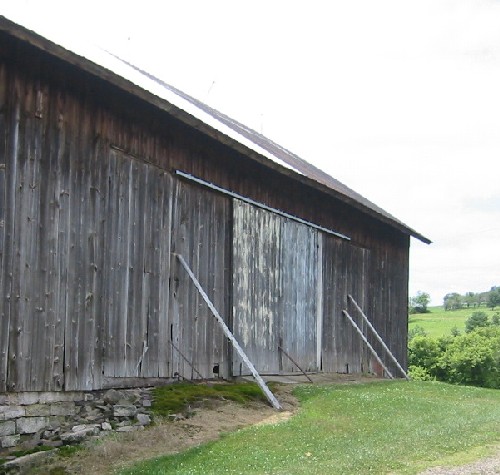 A barn from Locust Township in Columbia County that shows eaves-side access through large doors