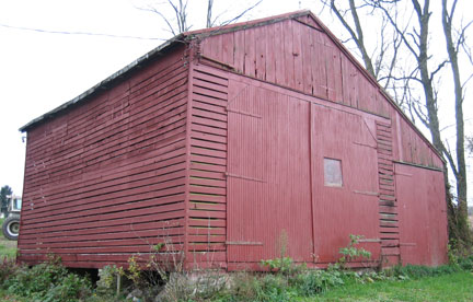 Machine shed with two integral corn cribs and shed roof extension, North Anville Township, Lebanon County, c. 1900-1930