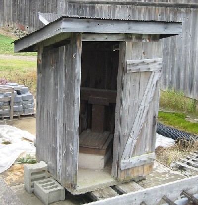 Image of a wood fram privy in Columbia County