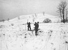 Winter excavations at Gower with Fort Hill visible in the distance
