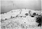 Winter excavations at Gower with Fort Hill visible in the distance